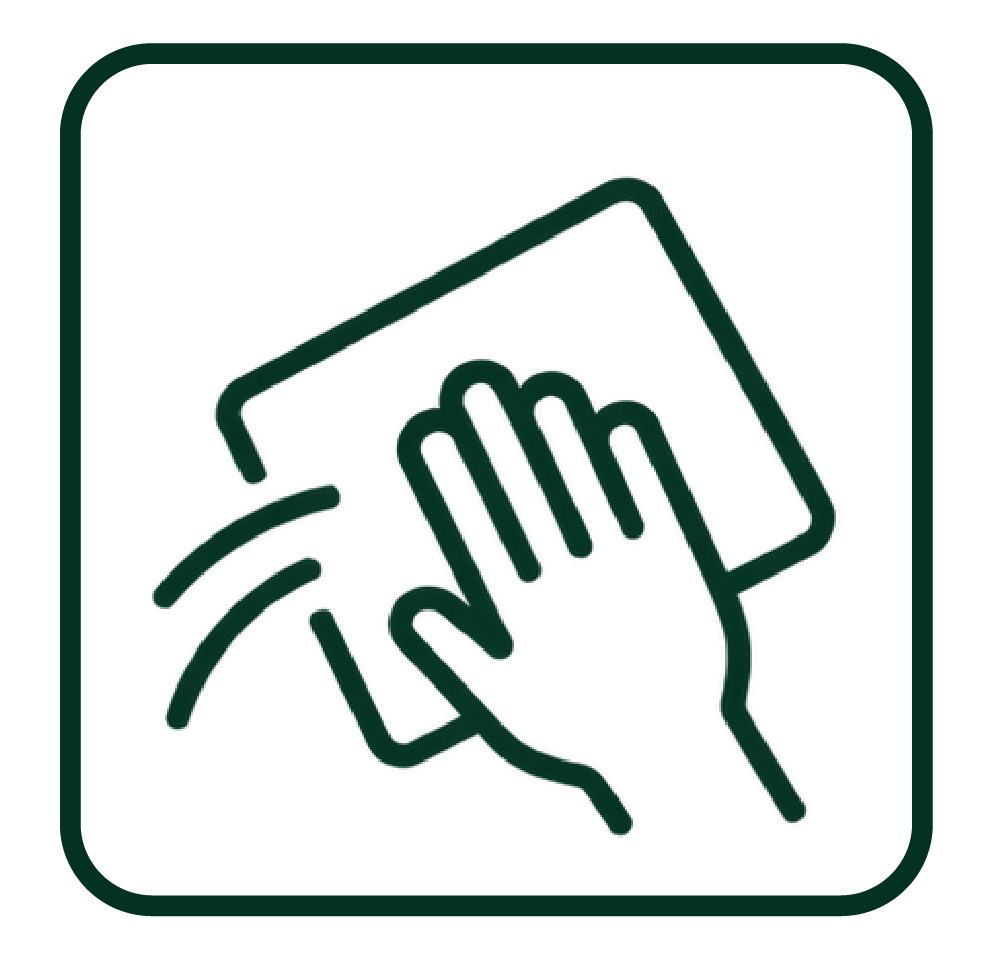 Wiping away excess oil with a soft cloth